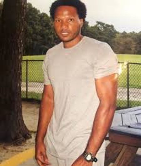 Mendeecees Harris om a white t-shirt poses for a picture.